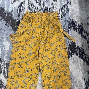 Flare pants with a tie belt. Never worn. Buyer pays cost of shipping